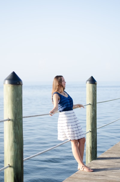 Woman leaned against the railing
